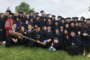 Group photo of all graduates and faculty